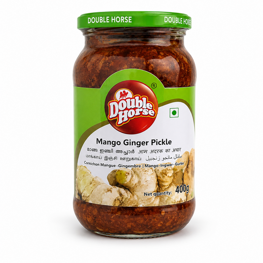 A professional studio shot of a 400g glass jar of Double Horse Mango Ginger Pickle. The jar is filled with a rich, dark reddish-brown textured pickle. The label features a vibrant green and white design with the red "Double Horse" logo at the top. The product name is printed in bold black letters, accompanied by translations in Malayalam, Hindi, Tamil, and Arabic. An image of fresh ginger roots is displayed at the bottom of the label. This product is available in the UK at theindianshelf.co.uk.