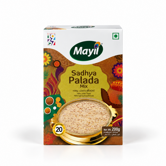 A 200g box of Mayil Sadhya Palada Mix featuring vibrant festive artwork and a golden bowl of creamy palada payasam. Available in the UK at theindianshelf.co.uk.