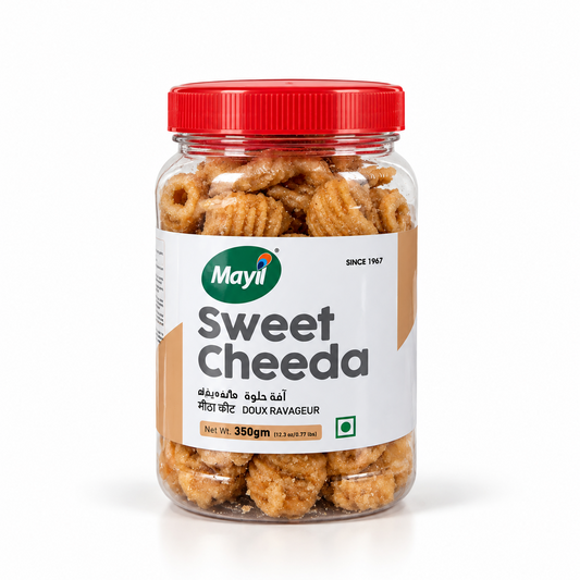 A 350g clear plastic jar of Mayil Sweet Cheeda featuring a vibrant red screw cap and a clean white label displaying ring-shaped sweet snacks. Available in the UK at theindianshelf.co.uk.