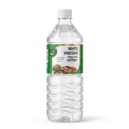A professional studio shot of a clear plastic bottle of Mayil White Vinegar. The bottle features a ribbed, easy-grip design and is filled with clear, transparent vinegar. The green and white label prominently displays the "Mayil" peacock logo and includes appetizing images of pickled vegetables. The product name is written in English, Malayalam, and Hindi.This product is available in the UK at theindianshelf.co.uk.