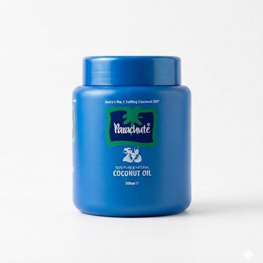A blue jar of Parachute 100% Pure & Natural Coconut Oil 500ml (16.9 fl oz), featuring India’s No. 1 selling coconut oil suitable for both culinary use and hair care, is available for purchase at theindianshelf.co.uk.