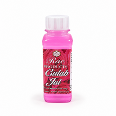 A bottle of RAC Products Gulab Jal rose water featuring vibrant pink liquid and a white screw cap, centered on a solid white background. Available in the UK at theindianshelf.co.uk.