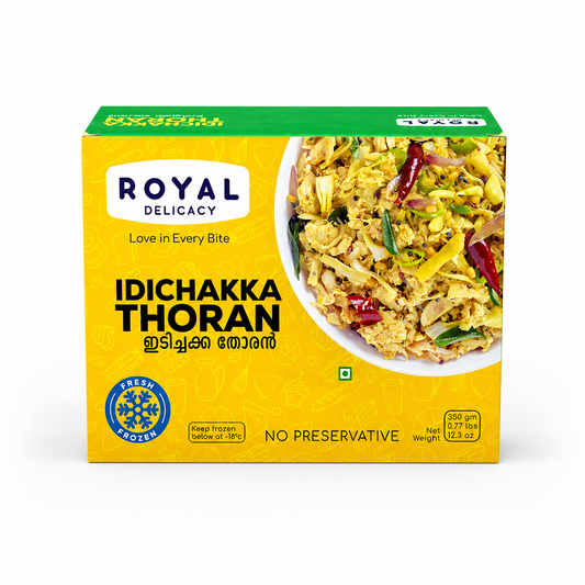 A professional studio shot of the Royal Delicacy Idichakka Thoran box. The packaging features a bright yellow background with subtle line art of kitchenware. A white bowl on the right side of the box is filled with the Idichakka Thoran, showing finely shredded young jackfruit mixed with green chilies, red chilies, and curry leaves.This product is available in the UK at theindianshelf.co.uk.