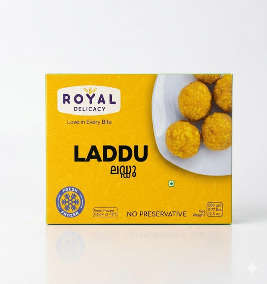 A yellow and white box of Royal Delicacy Laddu 350g (12.3 oz), featuring a traditional Indian sweet treat that is fresh frozen and contains no preservatives, is available for purchase at theindianshelf.co.uk. These classic dessert balls are crafted to offer "Love in Every Bite" and are a convenient frozen staple for celebrations or tea time.