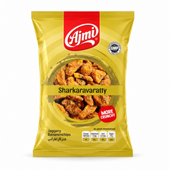 A yellow and red pouch of Ajmi Sharkaravaratty Jaggery Banana Chips featuring a central circular window illustrating crunchy jaggery-coated banana pieces, centered against a solid white background. Available in the UK at indianshelf.co.uk.
