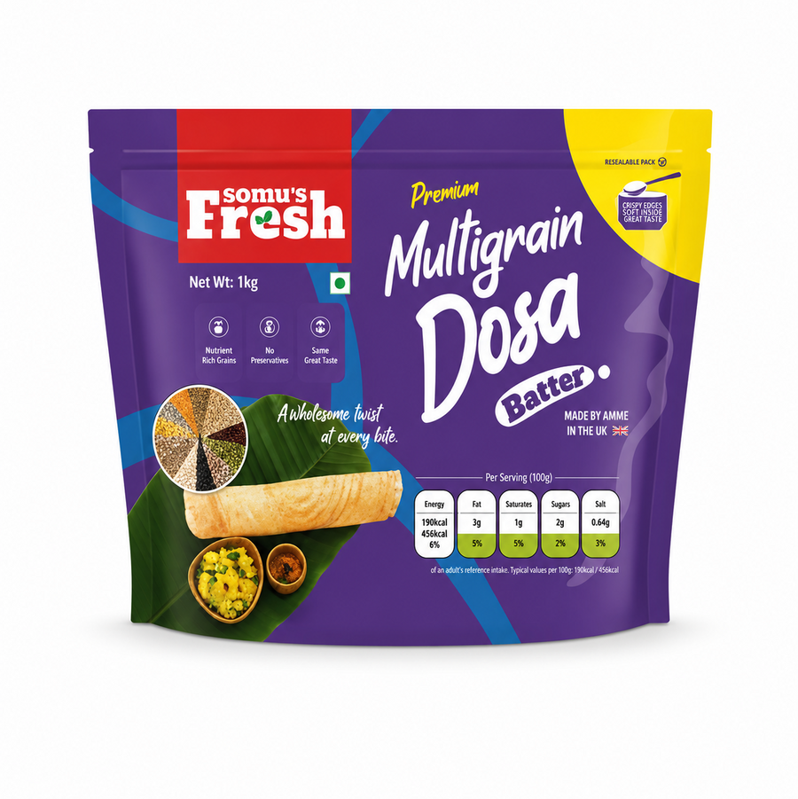 A studio product shot of a 1kg resealable stand-up pouch of Somu's Fresh Premium Multigrain Dosa Batter isolated against a white background. The purple and yellow packaging features a crispy dosa served on a banana leaf alongside a visual graphic of various grains and a nutritional breakdown chart.