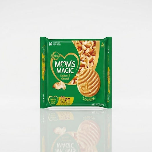 A green "Family Value Pack" of Sunfeast Mom's Magic Cashew & Almond Cookies. The 750g pack features a heart-shaped brand logo, an image of a golden cookie with a heart imprint, and a background filled with whole cashews and almonds. It contains 10 individual "Stay Fresh" packs.These cookies are available for purchase in the UK at theindianshelf.co.uk.