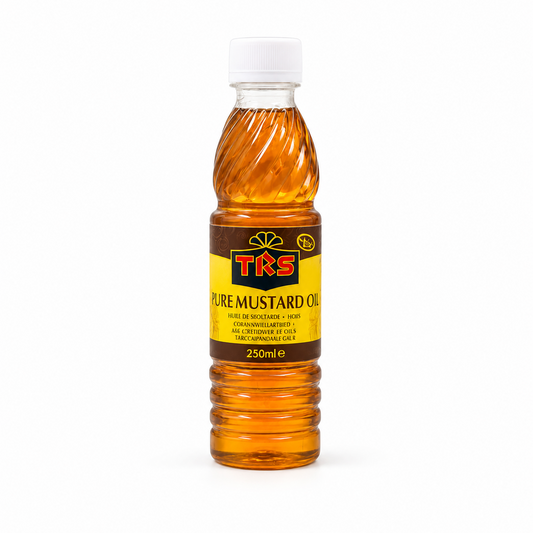 A 250ml clear bottle of TRS Pure Mustard Oil centered on a solid white background, featuring a golden-yellow oil with a white cap and a brown and yellow label bearing the TRS logo. This product is available in the UK at theindianshelf.co.uk.