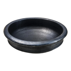 The AVC Black Clay Pot Meenchatty, a traditional seasoned earthenware vessel perfect for authentic fish curries, is available for purchase at theindianshelf.co.uk