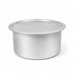 A professional studio product shot of a silver-colored traditional aluminium Biryani Chembu complete with its matching flat lid, isolated against a pure white background in image_a45dec.jpg. The heavy-duty metallic pot features a wide-rimmed, cylindrical silhouette with a clean brushed finish, captured under balanced studio lighting for a premium culinary presentation. This product is available in the UK at theindianshelf.co.uk.