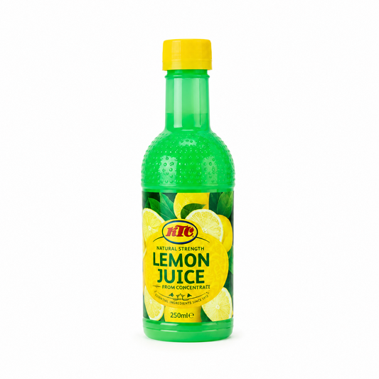 A 250ml green bottle of KTC Lemon Juice from Concentrate centered on a solid white background, featuring a yellow cap and a label illustrated with fresh lemons and green leaves. This product is available in the UK at theindianshelf.co.uk.