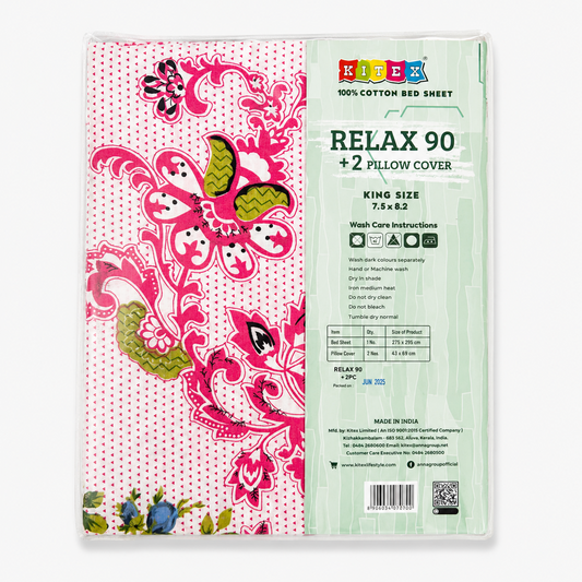 Kitex Relax 90 king size bed sheet set packaging centered on a solid white background, displaying a 100% cotton sheet featuring vibrant pink and olive green paisley floral prints with two matching pillow covers. Available in the UK at theindianshelf.co.uk.