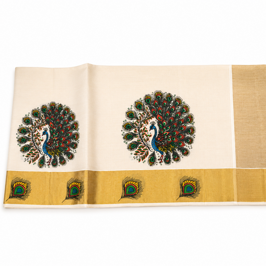 An unfolded off-white Kerala tissue saree laid flat horizontally against a solid white background, featuring repeating hand-painted circular peacock motifs in vibrant blue, green, and red along the body, a wide golden zari pallu end, and a golden kasavu bottom border detailed with peacock feather art.
