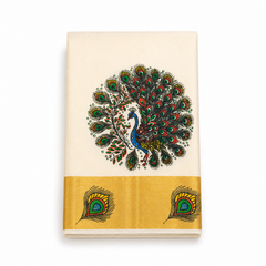 A neatly folded off-white Kerala tissue saree centered on a solid white background, featuring a vibrant hand-painted circular peacock motif in blue, green, and red, along with a wide golden kasavu border detailed with peacock feather motifs.